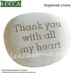 Engraved pebble stone with words decorative stone