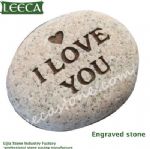 Engraved pebble stone with words decorative stone