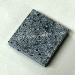 Small grey granite stone brick