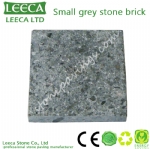 Small grey granite stone brick