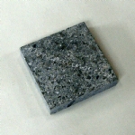 Small grey granite stone brick